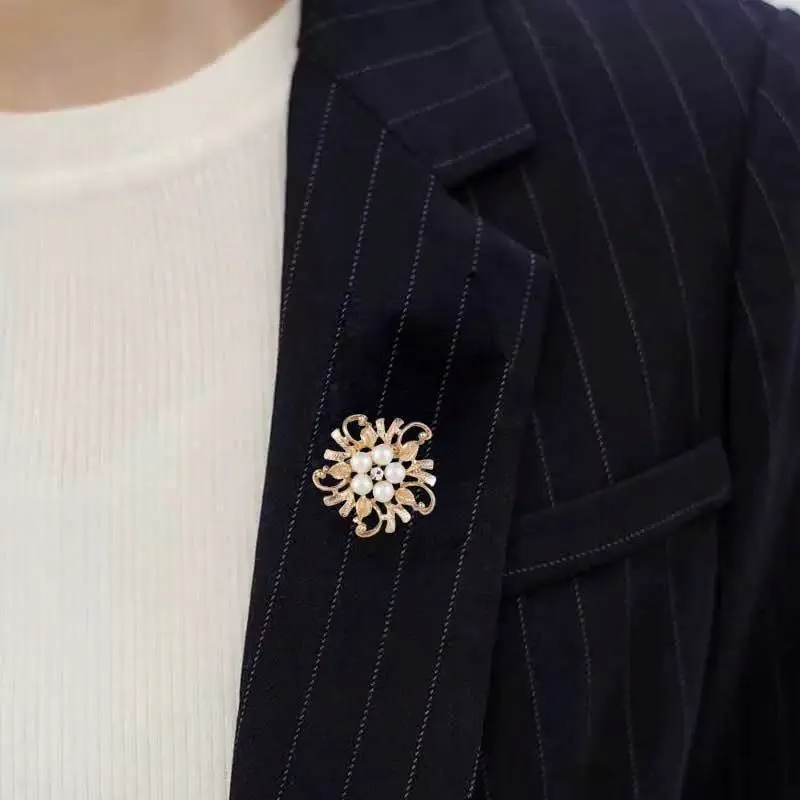 Golden flower with pearls - brooch with cubic zirconia