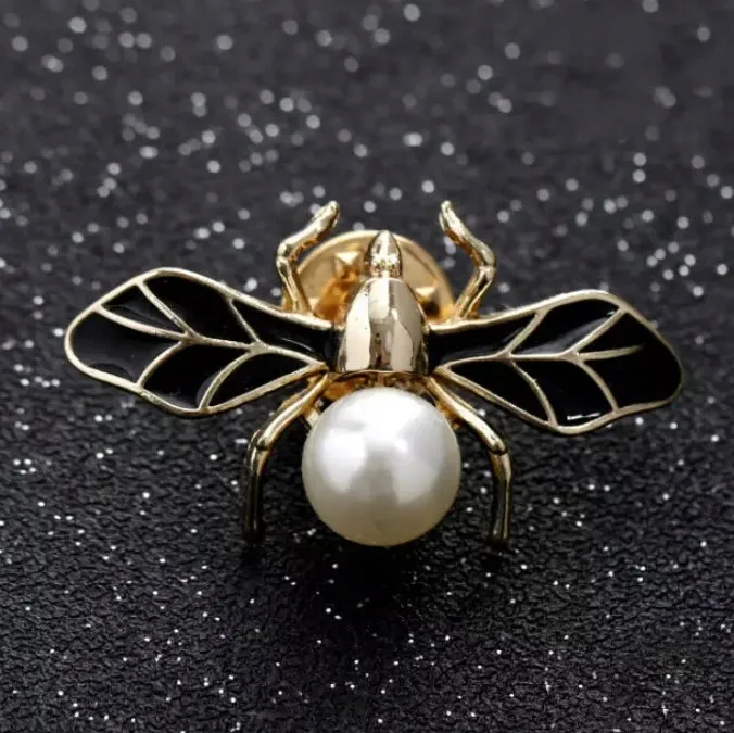 Golden fly insect with pearl enamel pin