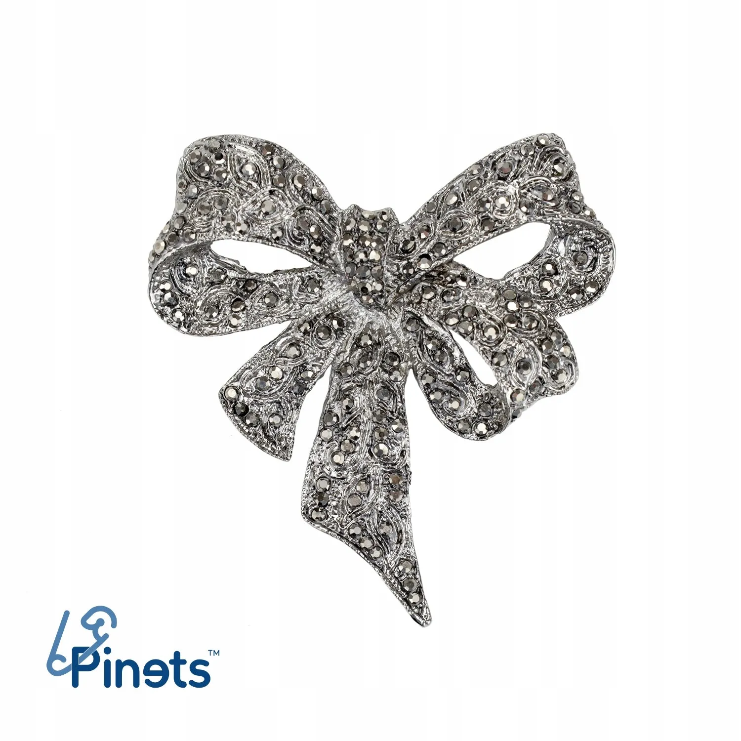 Silver bow with zircons - brooch