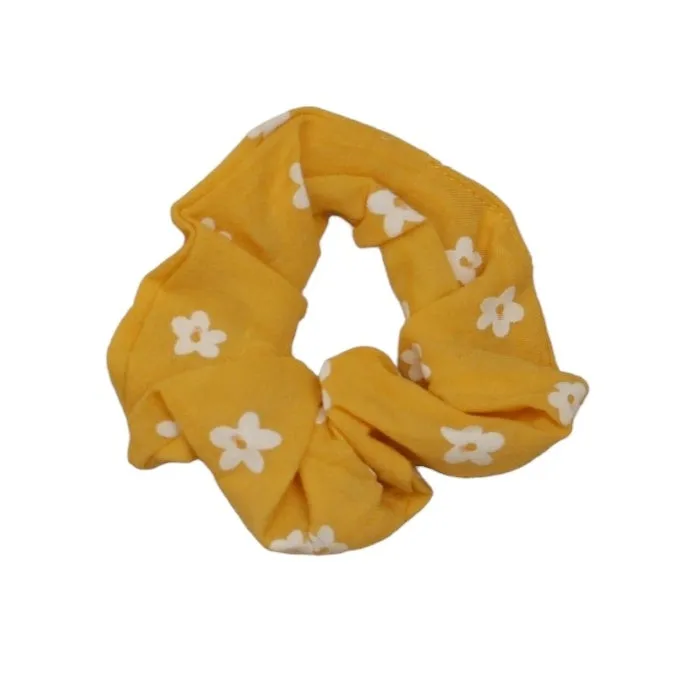 Sunshine Daisy Duo: Vibrant Yellow Twisted Headband and Floral Scrunchie Set